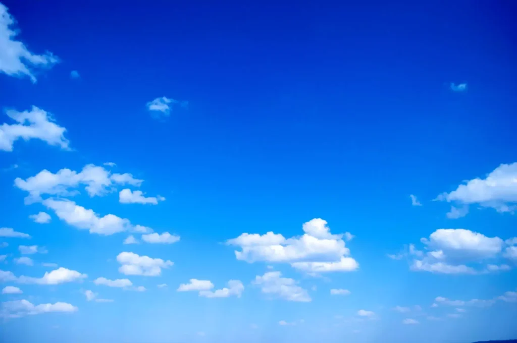 Deep blue sky over river while kayaking