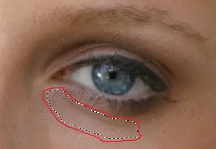 selecting the under-eye area to remove eye bags in photoshop