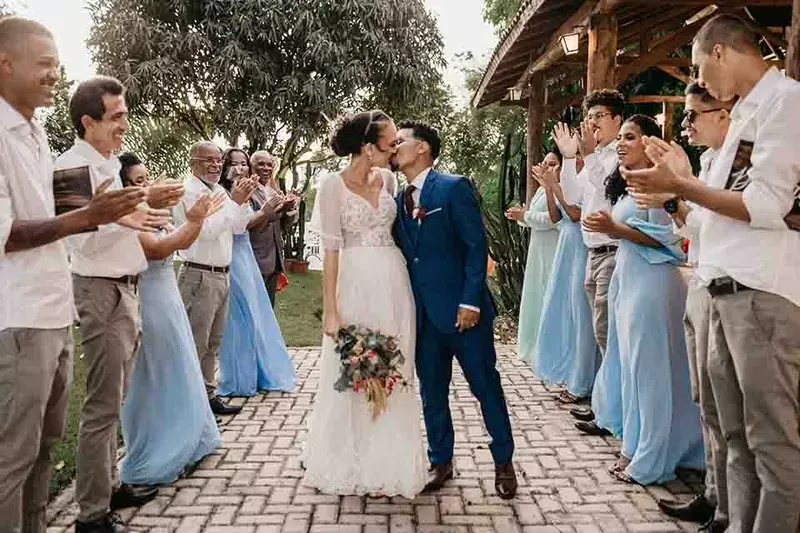 Wedding photography capturing the bride and groom's first kiss