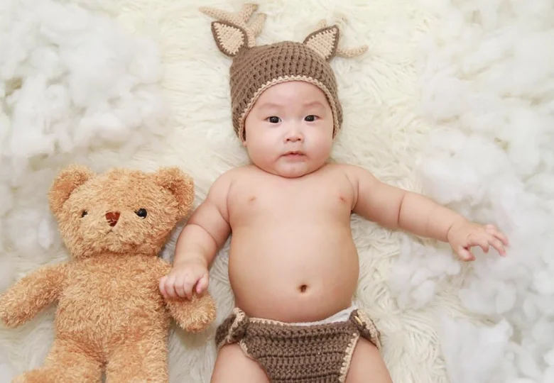baby with doll