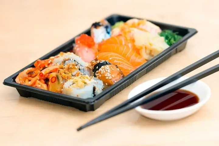 close up photo of sushi served on table